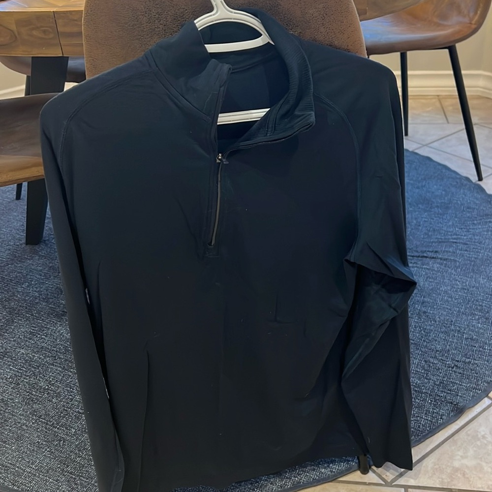 Men’s Lulu dark blue 1/4 zip exercise shirt. Great condition. No rips or tears.